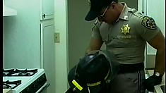 Fireman asks a hot cop to put out the fire deep inside his ass
